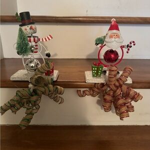 Santa and snowman stocking holders